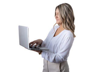 Businesswoman standing and working with laptop