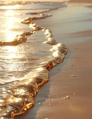Golden Ocean Wave Receding on Sandy Beach at Golden Hour With Gentle Sunlight Reflections Creating Shimmering Patterns