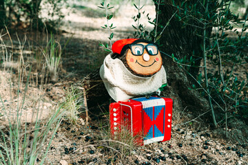 a Tio de Nadal with glasses in the forest