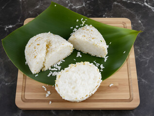 Traditional Steamed Rice Cakes on Banana Leaf