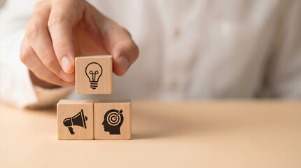 Business strategy, ideas, marketing, and achieving goals on a wood surface