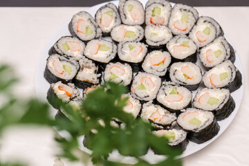 Sushi spread for casual gathering featuring fresh ingredients and savory flavors