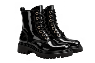 Pair of black patent leather combat boots with lace-up detail and chunky soles on transparent background