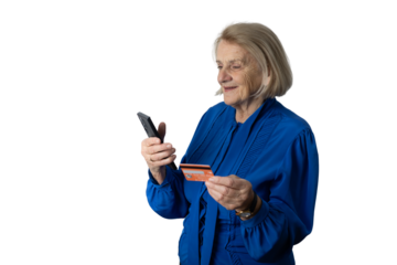 Senior woman making online credit card payment using smartphone