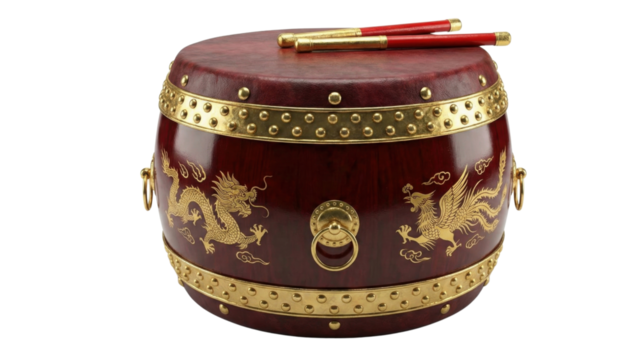 The Rhythmic Echo: A meticulously crafted drum, its rich maroon surface adorned with traditional golden engravings, embodies the cultural heritage. It stands as a beacon of rhythmic tradition.