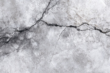 Obraz premium detailed close-up of cracked concrete surface showing texture and fractures