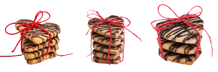 Delicious heart-shaped cookies with red ribbon on transparent background sweet treats studio