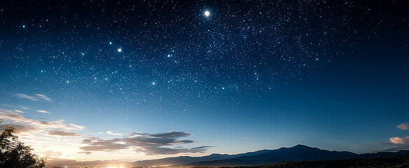 Stunning starry night sky over calm mountain landscape at dusk