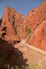 The Tianshan Grand Canyon or Kesileya Grand Canyon is a stunning natural feature in Xinjiang, China, characterized by its distinctive red canyons, formed by millions of years of wind and rain erosion.
