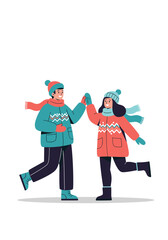 Two friends wearing colorful winter coats and scarves share a joyful high five while walking in a snowy outdoor scene during a chilly day.