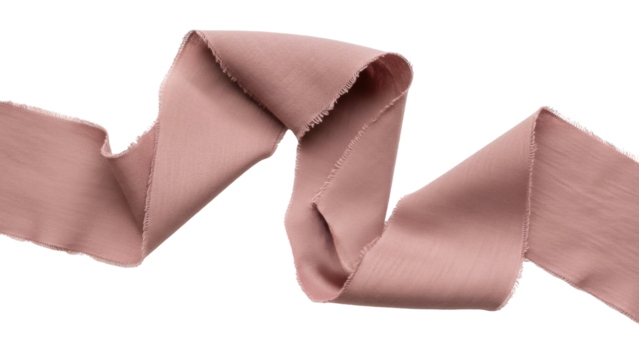 Isolated pink silk ribbon with raw edges forms a graceful wavy pattern on light surface