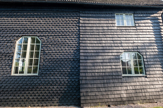 Black wooden old Pelarne church fasade in Sweden