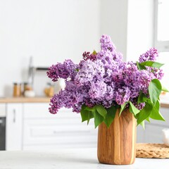 A vibrant bouquet of purple lilac flowers in a wooden vase on a white kitchen table.