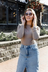 Portrait of Woman in Sunglasses Outdoors