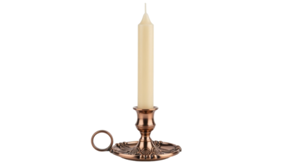 Isolated ornate candle in a vintage candlestick holder, creating a warm and inviting glow