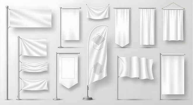 Collection of various blank white flags and banners on poles and hanging down