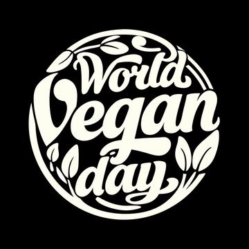 World Vegan Day cream text emblem with leaves vegetarian