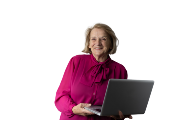 Senior woman smiling using a laptop, transparent background