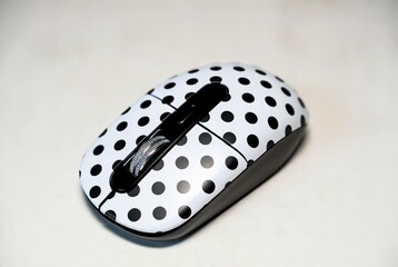 Polka Dot Computer Mouse Design Cute and Modern Tech Accessory.