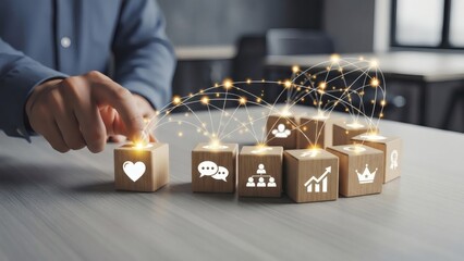 Emotional intelligence and leadership concept. Hand organizing wooden blocks with heart and teamwork icons to illustrate team connection and communication.
