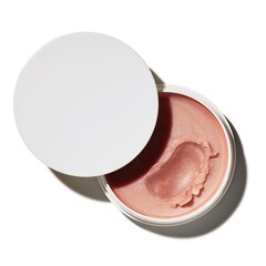 Hydrating lip mask in open jar offers intense moisture & a supple pout for ultimate lip care, perfect for beauty blogs and skincare campaigns