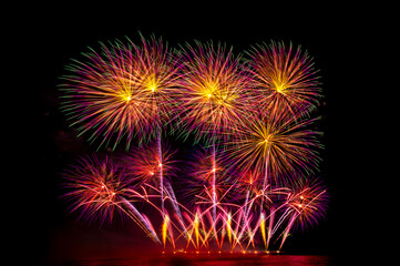 colourful firework display set for celebration happy new year and merry christmas and  fireworks on black background