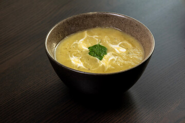 Potato and Leek Soup with Cream in Bowl – Cozy Comfort Food