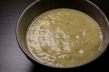 Creamy Potato and Leek Soup on Dark Background – Cozy Comfort Food