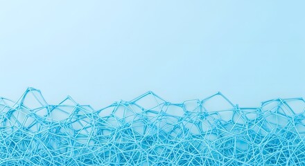 Barbed wire fence pattern against a cold blue winter sky backdrop