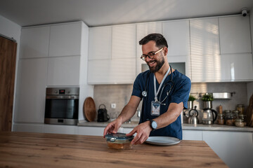Male nurse preparing healthy meal for break