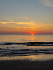 the sky at dawn on the beach
