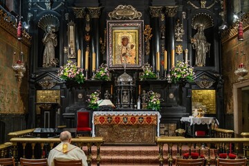 Roman Catholic Priest Praying The