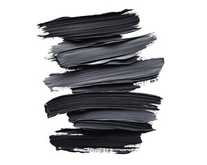 Stacked horizontal streaks of thick, dark gray cosmetic material create abstract texture against white background