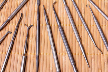 lots of different old dental instruments
