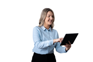 Businesswoman standing smiling working on digital tablet