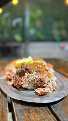 Asado de cordero patag&oacute;nico. Fin del mundo, Ushuaia, Argentina	
