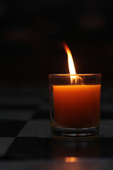 Lit candles for dinner in the dark, burning candles	