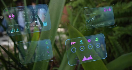 Floating four translucent holographic data panels over garden leaves, showing piggy-bank icons