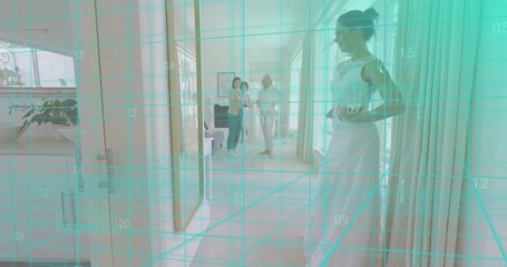 Posing woman in wedding gown in fitting hallway with group talking, teal grid overlay, copy space