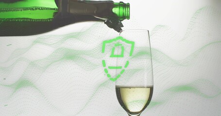 Pouring green bottle sending pale sparkling wine into studio champagne flute, with shield overlay