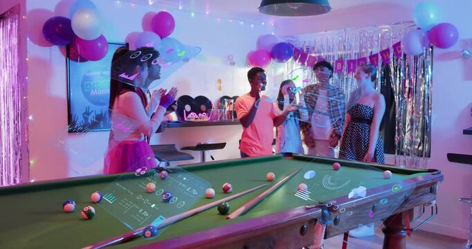 Group raising gift, clapping and hugging woman on birthday, holo FX on pool table aiding party