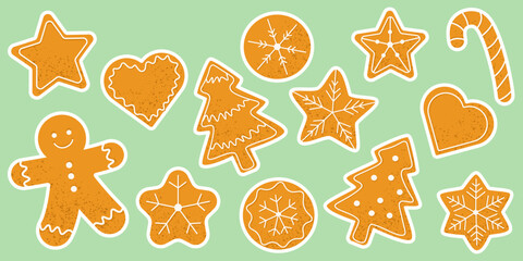 A collection of gingerbread stickers. Christmas holiday sweets with stars, hearts, trees, snowflakes, candy cane and gingerbread man on pastel background