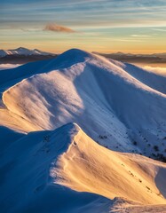Majestic Snowy Mountain Landscape at Sunrise Under Colorful Sky