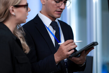 Positive code review vibes. Smiling tech lead guides colleague explaining successful script screen reflects collaborative synergy modern development hub winning team builds next big thing now.