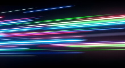 Streaks of vibrant neon light trails in blue pink green and white against a dark background motion