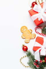 Christmas presents and holiday decorations at white background,