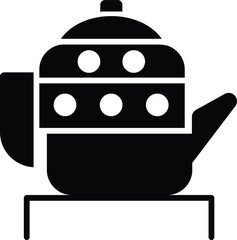 teapot with cup of tea