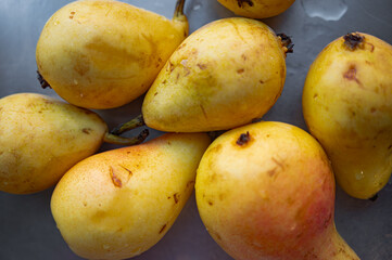 Ripe yellow pears close-up – fresh organic fruit texture