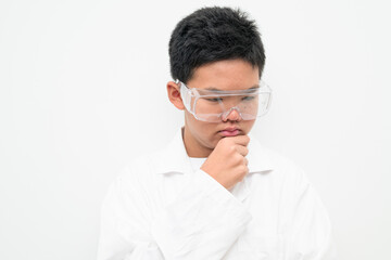 Pensive Young Asian Boy Dressed as Scientist with Lab Coat Thinking