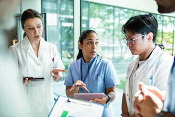 Adult medical team focused on patient care in hospital